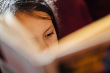 child reading a book