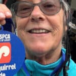cyclist with medal for completing 35 mile cycle ride