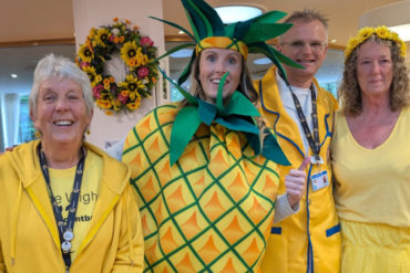 People at the hospice dressed in yellow outfits