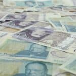 lots of five pound and twenty pound notes sterling cash money