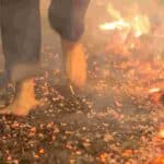 person walking on hot coals