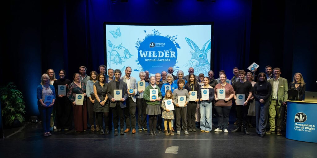 Hampshire & Isle of Wight Wildlife Trust Wilder Award winners on stage