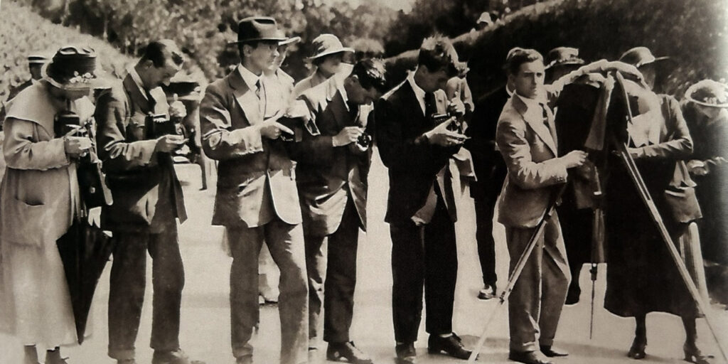 Innell Jolliffe with news photographers recording Earl Jellicoe inspect scout troop in St Lawrence in 1929