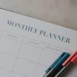 Monthly planner notebook and pens