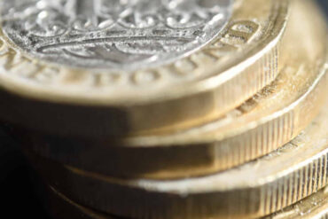 Pile of one pound coins
