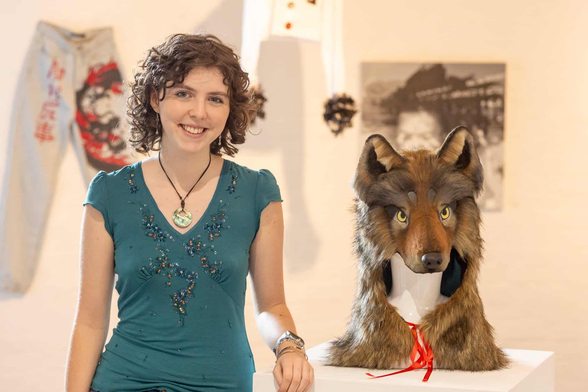 Daisy Morris with her artwork
