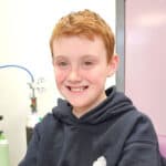 Toby smiling at the camera