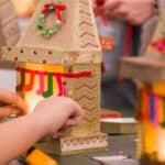 children taking part in a christmas themed craft workshop