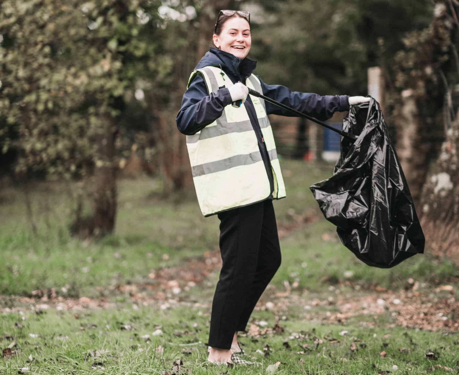 woman litter picking in the park