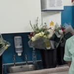 A&E nurse with donations of flowers