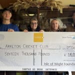 Giant cheque being presented to Arreton Cricket club