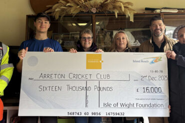 Giant cheque being presented to Arreton Cricket club