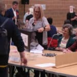 Ballot papers being poured out at the election count