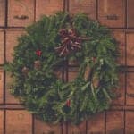 christmas wreath on a background of wooden drawers