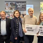 Geoff Underwood, David Jackson, representatives of the Seaview Sailing Trust and Brighstone Primary School