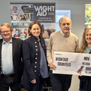 Geoff Underwood, David Jackson, representatives of the Seaview Sailing Trust and Brighstone Primary School