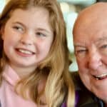 John Howe with his granddaughter