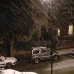 Photo from bedroom window of sleet outside on street
