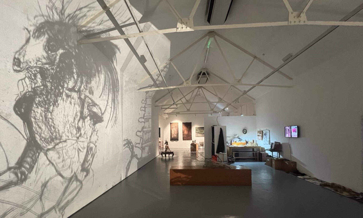 Rag and Bones exhibition at Quay Arts showing artworks and shadows on display