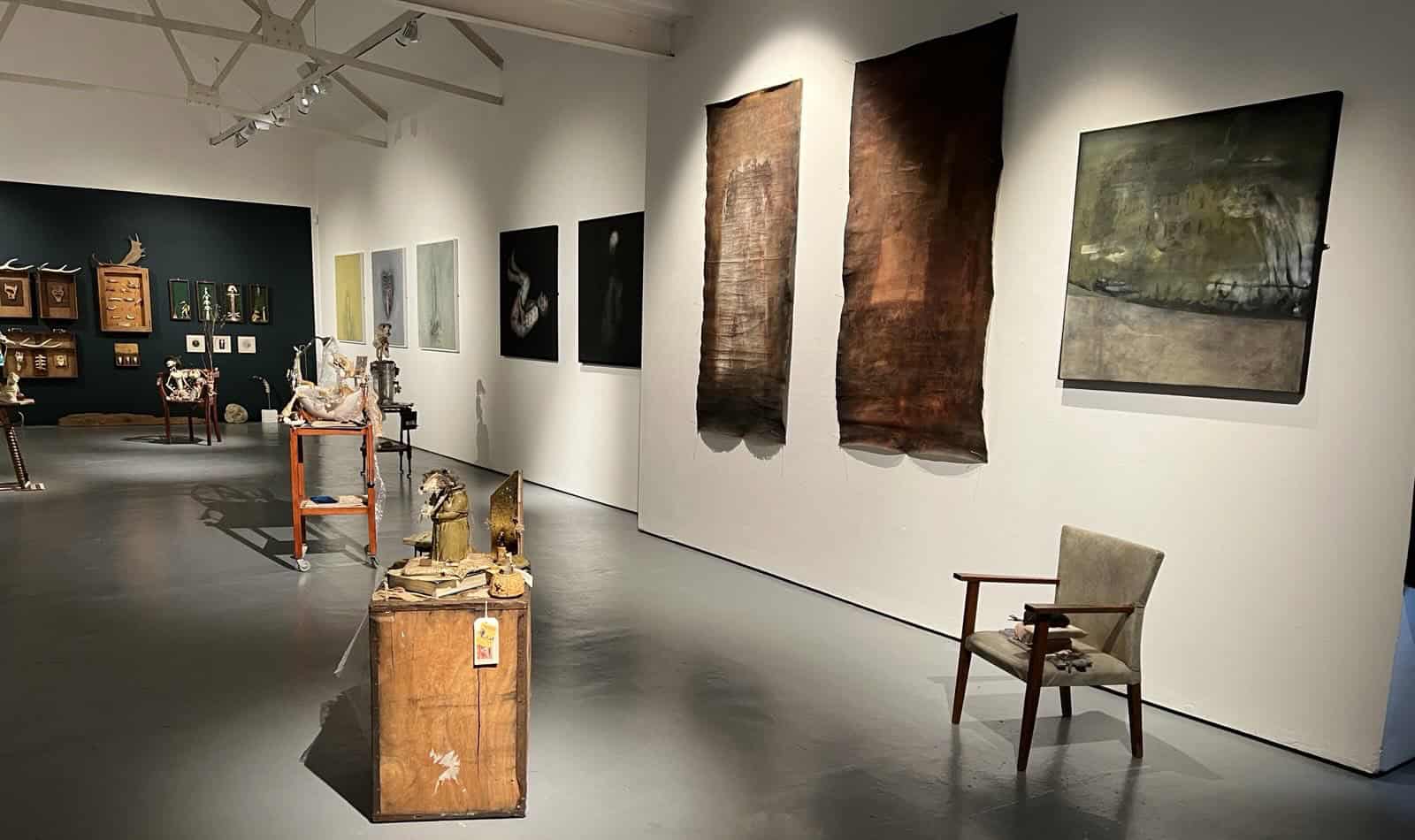 Rag and Bones exhibition at Quay Arts showing artworks and shadows on display