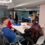Young people hanging out in the lounge area of Sandown Town Hall