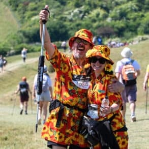 People dressed in sunflower patterned shirts on Walk the Wight