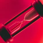 egg timer against as red background