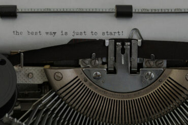 paper in typewriter with the words 'the best way to start!' typed on the paper