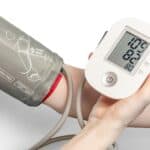 person taking their blood pressure