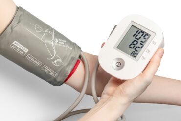 person taking their blood pressure