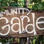 sign for community garden on allotment fencing