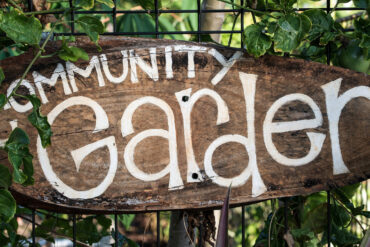 sign for community garden on allotment fencing