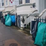 Bin bags on George Street property railings