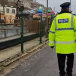 Policeman walking along shanklin seafront