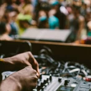 DJ playing music to woodland audience