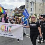Out on an Island team taking part in Pride Parade