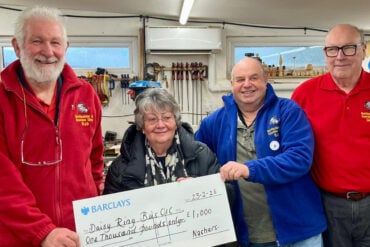 Trustees from Nettlestone and Seaview Shed presenting their cheque for £1,000 to Michele Newton