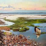 Painting of a woman crouching down on the beach