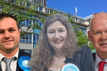 county hall in background with ed blake, caroline gladwin and geoff brodie in foreground