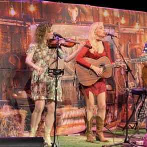 The nashville nights trio performing on stage