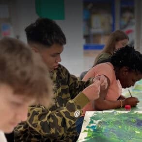 Pupils painting during Future Creative Careers Week