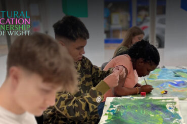 Pupils painting during Future Creative Careers Week
