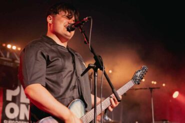 Guitarist performimg on stage