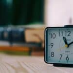Alarm clock on bedside table