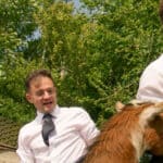 The Apprentice contestants mucking out the goats