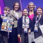 Pupils on stage with Janet Owen at the Bett UK 2026 Award Ceremony