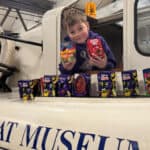 Arlo Daish-Miller getting an early preview of Easter Eggs and boats at the museum ahead of Easter