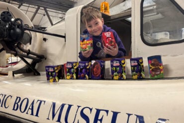 Arlo Daish-Miller getting an early preview of Easter Eggs and boats at the museum ahead of Easter