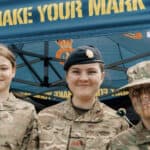 Three cadets at the Army stand