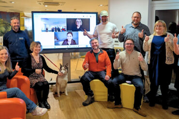 Group of people smiling for the camera